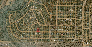 Beautiful, heavily treed lot in White Mountain Lakes with water on Silver Creek Golf Club in Arizona - for sale on GolfHomes.com, golf home, golf lot