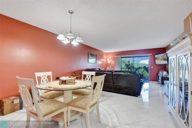 This is the one! A top-floor, move-in-ready 2 bed, 2 bath condo on Flamingo Lakes Country Club in Florida - for sale on GolfHomes.com, golf home, golf lot