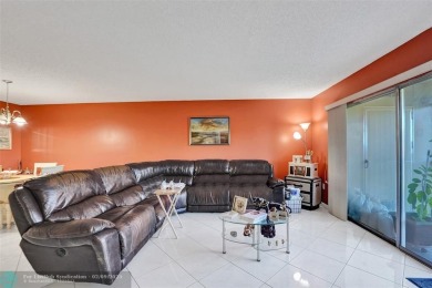 This is the one! A top-floor, move-in-ready 2 bed, 2 bath condo on Flamingo Lakes Country Club in Florida - for sale on GolfHomes.com, golf home, golf lot
