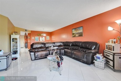 This is the one! A top-floor, move-in-ready 2 bed, 2 bath condo on Flamingo Lakes Country Club in Florida - for sale on GolfHomes.com, golf home, golf lot