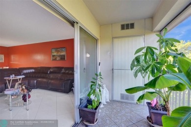 This is the one! A top-floor, move-in-ready 2 bed, 2 bath condo on Flamingo Lakes Country Club in Florida - for sale on GolfHomes.com, golf home, golf lot