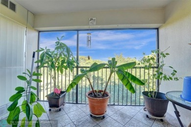 This is the one! A top-floor, move-in-ready 2 bed, 2 bath condo on Flamingo Lakes Country Club in Florida - for sale on GolfHomes.com, golf home, golf lot