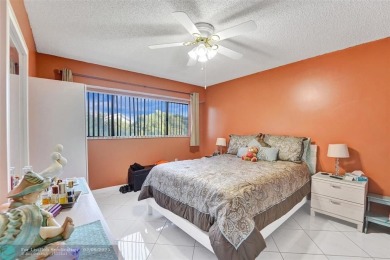 This is the one! A top-floor, move-in-ready 2 bed, 2 bath condo on Flamingo Lakes Country Club in Florida - for sale on GolfHomes.com, golf home, golf lot