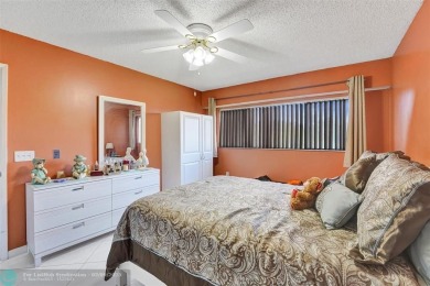 This is the one! A top-floor, move-in-ready 2 bed, 2 bath condo on Flamingo Lakes Country Club in Florida - for sale on GolfHomes.com, golf home, golf lot