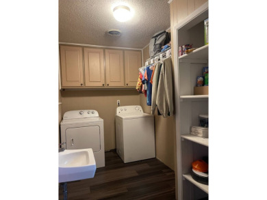 Welcome to this charming 3-bedroom, 2-bath home located in the on Sunset Hills Golf Course in Oklahoma - for sale on GolfHomes.com, golf home, golf lot