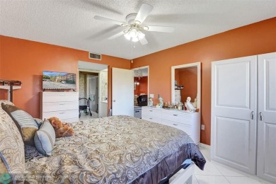 This is the one! A top-floor, move-in-ready 2 bed, 2 bath condo on Flamingo Lakes Country Club in Florida - for sale on GolfHomes.com, golf home, golf lot