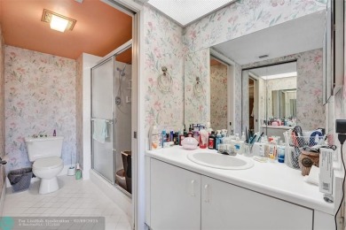 This is the one! A top-floor, move-in-ready 2 bed, 2 bath condo on Flamingo Lakes Country Club in Florida - for sale on GolfHomes.com, golf home, golf lot