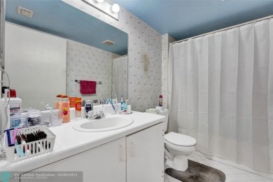 This is the one! A top-floor, move-in-ready 2 bed, 2 bath condo on Flamingo Lakes Country Club in Florida - for sale on GolfHomes.com, golf home, golf lot