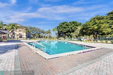 This is the one! A top-floor, move-in-ready 2 bed, 2 bath condo on Flamingo Lakes Country Club in Florida - for sale on GolfHomes.com, golf home, golf lot