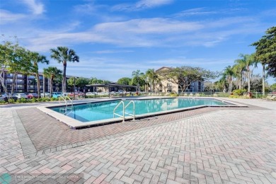 This is the one! A top-floor, move-in-ready 2 bed, 2 bath condo on Flamingo Lakes Country Club in Florida - for sale on GolfHomes.com, golf home, golf lot