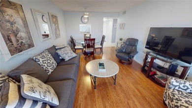 Open the front door to a stunning long lake view!  This is a on Sunrise Lakes Phase III in Florida - for sale on GolfHomes.com, golf home, golf lot