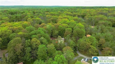 This beautifully renovated 3-bedroom, 3-bathroom home is the on Pocono Farms Country Club in Pennsylvania - for sale on GolfHomes.com, golf home, golf lot