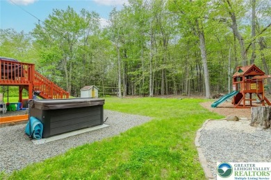 This beautifully renovated 3-bedroom, 3-bathroom home is the on Pocono Farms Country Club in Pennsylvania - for sale on GolfHomes.com, golf home, golf lot