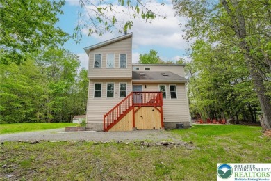 This beautifully renovated 3-bedroom, 3-bathroom home is the on Pocono Farms Country Club in Pennsylvania - for sale on GolfHomes.com, golf home, golf lot