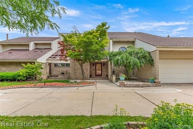 Experience refined contemporary living in this exquisite on Riverview Highlands Golf Club  in Michigan - for sale on GolfHomes.com, golf home, golf lot