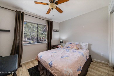 Nestled in the peaceful pines, this fully furnished 3-bedroom on Pinetop Lakes Golf and Country Club in Arizona - for sale on GolfHomes.com, golf home, golf lot