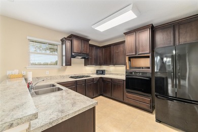 CHAMPIONSHIP GOLF COURSE VIEWS! Welcome to Leesburg's Premier on Arlington Ridge Golf Club in Florida - for sale on GolfHomes.com, golf home, golf lot