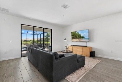 Experience the ultimate Florida lifestyle in this luxurious on Esplanade Golf and Country at Lakewood Ranch in Florida - for sale on GolfHomes.com, golf home, golf lot