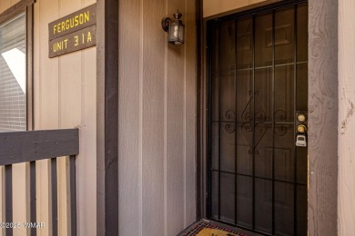 Nestled in the peaceful pines, this fully furnished 3-bedroom on Pinetop Lakes Golf and Country Club in Arizona - for sale on GolfHomes.com, golf home, golf lot