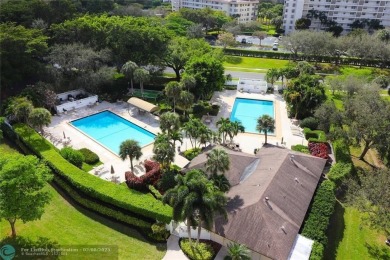 Spectacular Views of Lake and Golf Course from this 9th Floor 2 on Palm-Aire Country Club and Resort - Palms in Florida - for sale on GolfHomes.com, golf home, golf lot