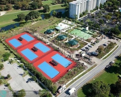 Spectacular Views of Lake and Golf Course from this 9th Floor 2 on Palm-Aire Country Club and Resort - Palms in Florida - for sale on GolfHomes.com, golf home, golf lot