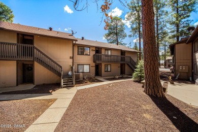 Nestled in the peaceful pines, this fully furnished 3-bedroom on Pinetop Lakes Golf and Country Club in Arizona - for sale on GolfHomes.com, golf home, golf lot