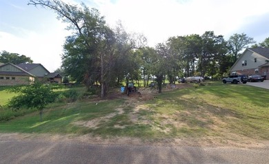 Enjoy peaceful lake living on this 0.23-acre partially wooded on Cedar Creek Country Club in Texas - for sale on GolfHomes.com, golf home, golf lot