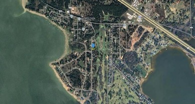Enjoy peaceful lake living on this 0.23-acre partially wooded on Cedar Creek Country Club in Texas - for sale on GolfHomes.com, golf home, golf lot