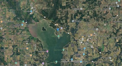 Enjoy peaceful lake living on this 0.23-acre partially wooded on Cedar Creek Country Club in Texas - for sale on GolfHomes.com, golf home, golf lot