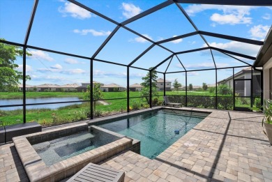 Experience the ultimate Florida lifestyle in this luxurious on Esplanade Golf and Country at Lakewood Ranch in Florida - for sale on GolfHomes.com, golf home, golf lot