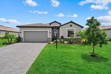 Experience the ultimate Florida lifestyle in this luxurious on Esplanade Golf and Country at Lakewood Ranch in Florida - for sale on GolfHomes.com, golf home, golf lot