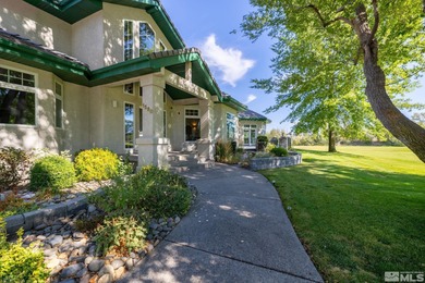 Nestled on a lush 1-acre lot along the scenic Carson Valley Golf on Carson Valley Golf Course in Nevada - for sale on GolfHomes.com, golf home, golf lot