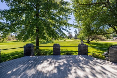 Nestled on a lush 1-acre lot along the scenic Carson Valley Golf on Carson Valley Golf Course in Nevada - for sale on GolfHomes.com, golf home, golf lot