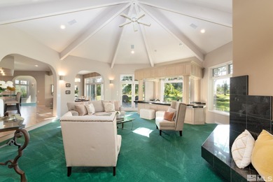 Nestled on a lush 1-acre lot along the scenic Carson Valley Golf on Carson Valley Golf Course in Nevada - for sale on GolfHomes.com, golf home, golf lot