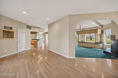 Nestled on a lush 1-acre lot along the scenic Carson Valley Golf on Carson Valley Golf Course in Nevada - for sale on GolfHomes.com, golf home, golf lot