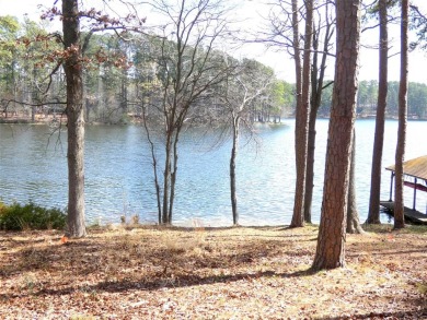 WATERFRONT LOT + 3BD-2BA home in Holly Lake Ranch, providing on Holly Lake Ranch Golf Club in Texas - for sale on GolfHomes.com, golf home, golf lot