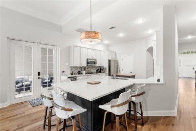 Located in one of Windermere's most sought-after guard-gated on The Golden Bear Club At Keenes Pointe in Florida - for sale on GolfHomes.com, golf home, golf lot