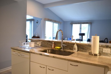 WELL DESIRED Yarmouth Port. 2-bed, 3 bath, 2 car garage, central on The Club At Yarmouthport in Massachusetts - for sale on GolfHomes.com, golf home, golf lot