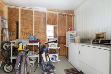 This 1982 manufactured home has 2 bedrooms, 2 bathrooms and is on Maple Leaf Golf and Country Club in Florida - for sale on GolfHomes.com, golf home, golf lot