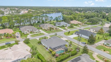 Nestled within the guard-gated Spruce Creek Fly-In community on Spruce Creek Golf Club in Florida - for sale on GolfHomes.com, golf home, golf lot