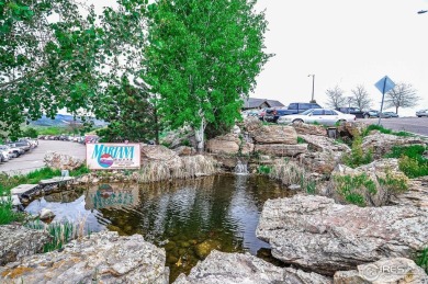 This low-maintenance, lock and leave, ranch-style patio home is on Mariana Butte Golf Course in Colorado - for sale on GolfHomes.com, golf home, golf lot