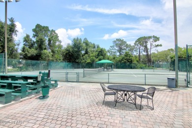 Nestled within the guard-gated Spruce Creek Fly-In community on Spruce Creek Golf Club in Florida - for sale on GolfHomes.com, golf home, golf lot