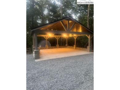 Envision your family gathering in this cozy custom-built cottage on High Meadows Golf and Country Club in North Carolina - for sale on GolfHomes.com, golf home, golf lot