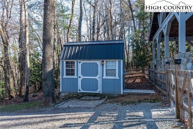 Envision your family gathering in this cozy custom-built cottage on High Meadows Golf and Country Club in North Carolina - for sale on GolfHomes.com, golf home, golf lot