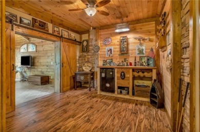 Once in a while, a home comes along that is truly in a class of on The Highlands Course at Lake Arrowhead in Georgia - for sale on GolfHomes.com, golf home, golf lot