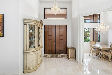 Welcome home to this sprawling executive estate in the exclusive on Bocaire Country Club in Florida - for sale on GolfHomes.com, golf home, golf lot