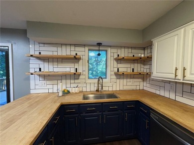 Charming 3 bedroom 2 bath home on a large corner lot.  Kitchen on Bella Vista Country Club - Berksdale in Arkansas - for sale on GolfHomes.com, golf home, golf lot