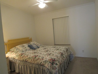 2005 Palm Harbor mobile home with a large (12x20) Florida room on Spanish Lakes Golf Village in Florida - for sale on GolfHomes.com, golf home, golf lot