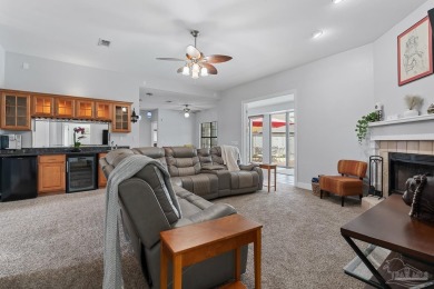Welcome to your dream home at 3849 Saber Tooth Circle, nestled on Tiger Point Golf and Country Club in Florida - for sale on GolfHomes.com, golf home, golf lot