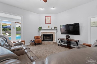Welcome to your dream home at 3849 Saber Tooth Circle, nestled on Tiger Point Golf and Country Club in Florida - for sale on GolfHomes.com, golf home, golf lot